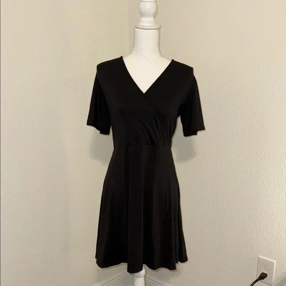 beautiful black dresses to wear to a wedding URSULA BLACK KNIT PEPLUM MINI DRESS – Bella Galvan